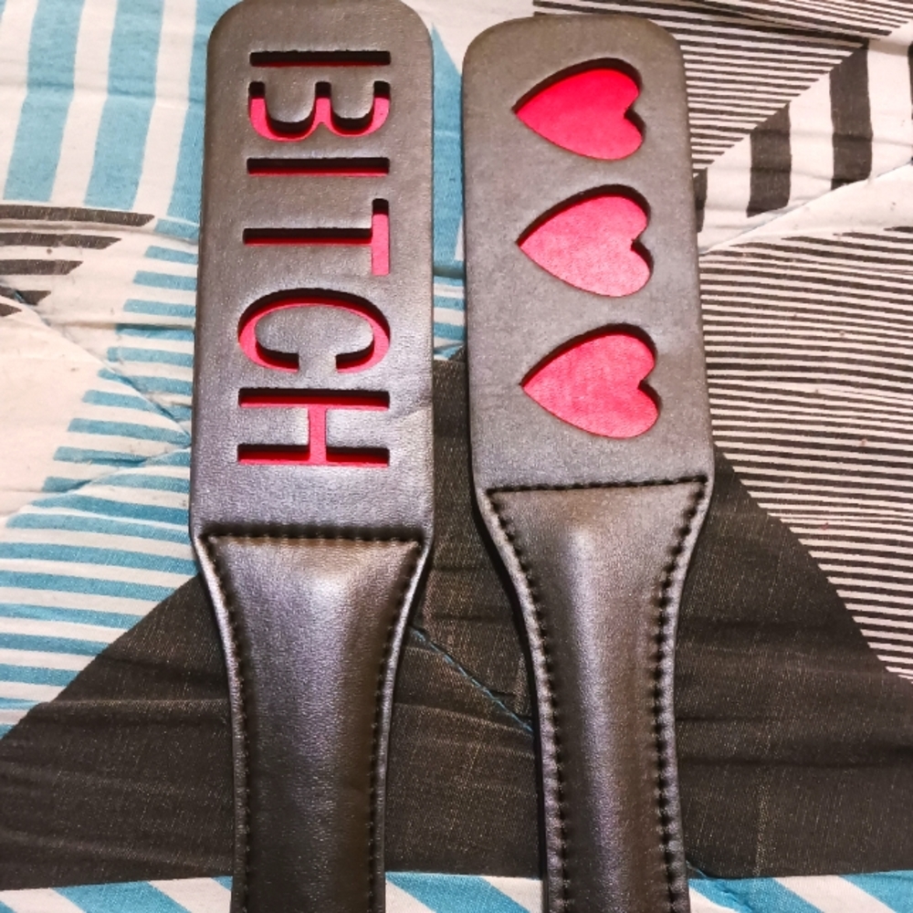 2 faux leather paddles